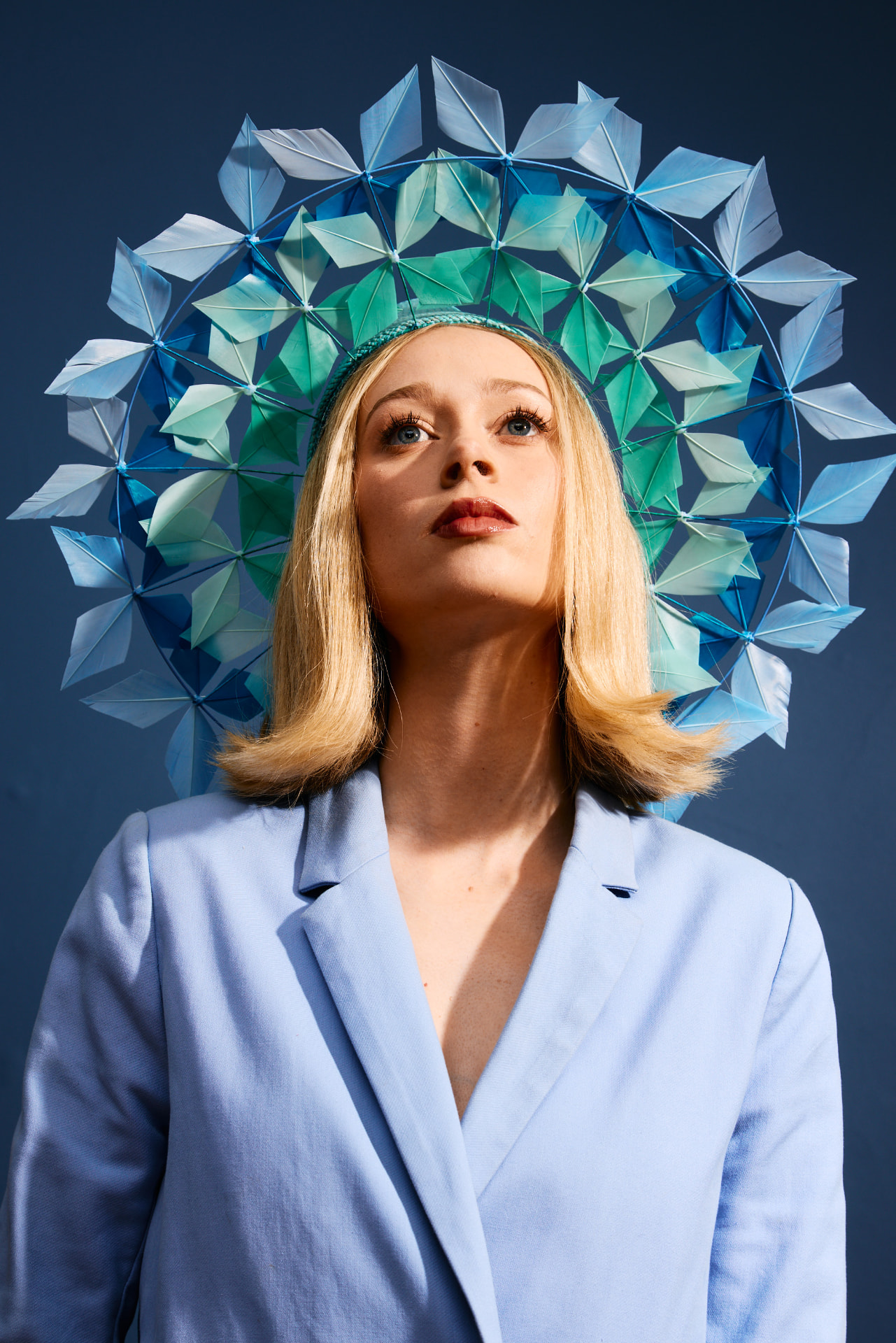 Halo Theory, a sculptural blue and green feather halo